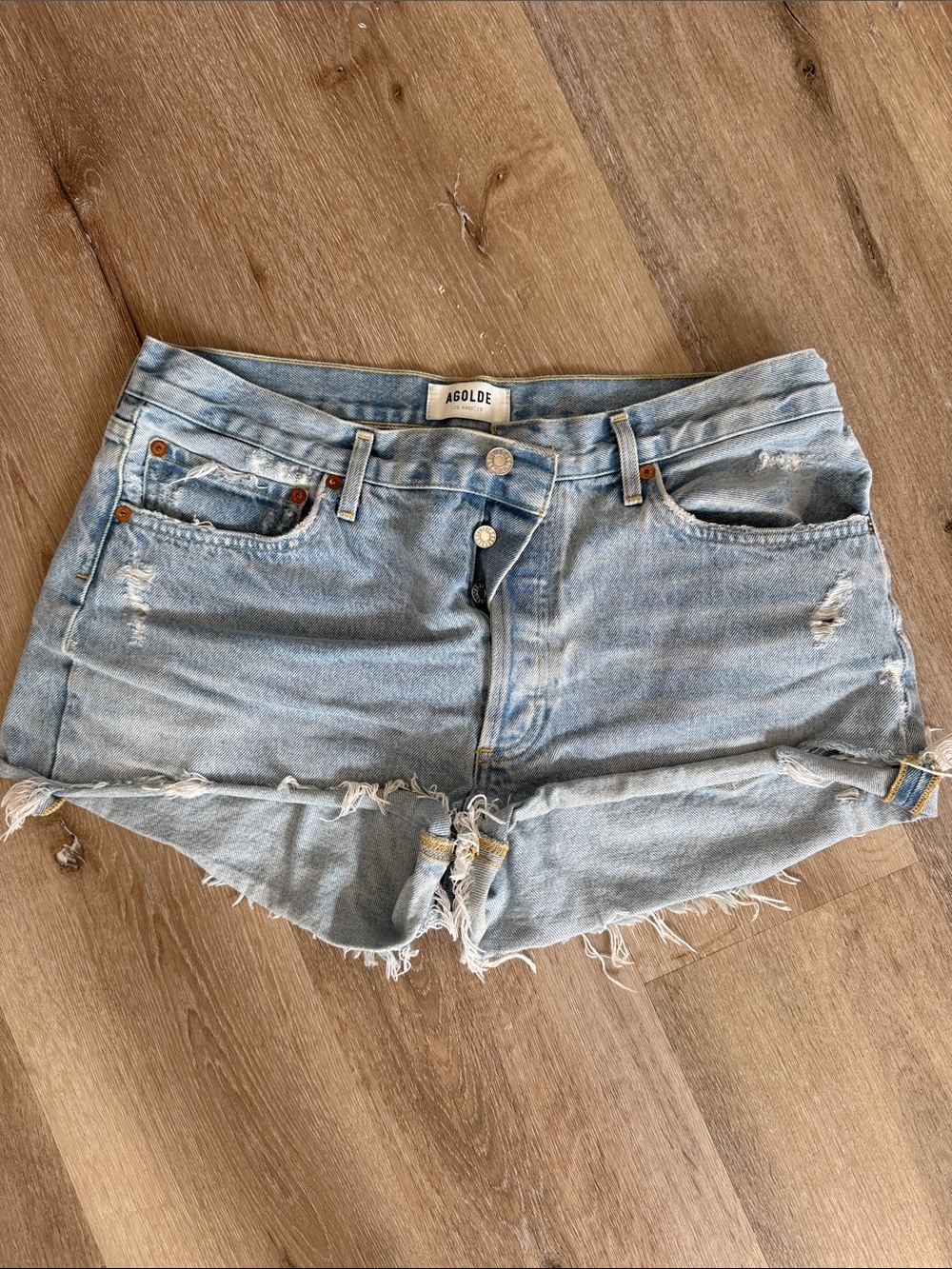 Agolde Light Wash Distressed Denim Cutoff Shorts